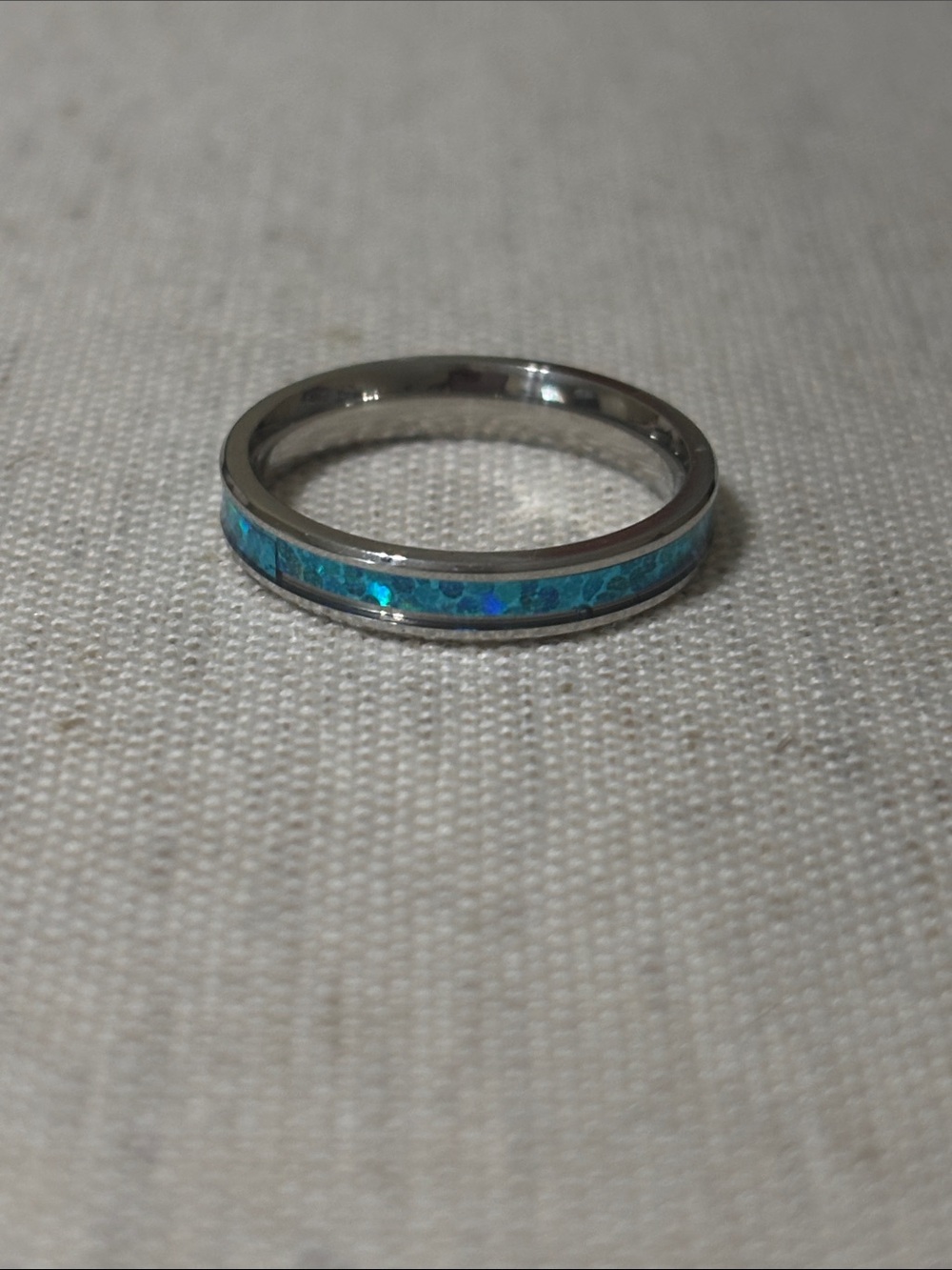 Inlaid stainless steel band